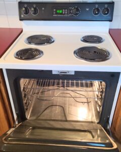 clean kitchen stove after move-out clean